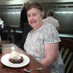 Julia with Kelsey's chocolate caramel  tart a la mode and birthday candle at Fortify Restaurant in Clayton, GA, August 8, 2019