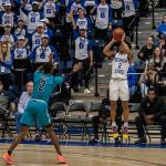 Justin Roberts guns a three pointer