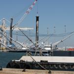 Falcon 9 1051.3 used to launch Starlink-3 on January 29, 2020 and successfully landed and returned to Port Canaveral as seen from deck of Fishlips Restaurant
