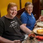 Sam honored with rice block with birthday candle at Fuji Ya in Tucker