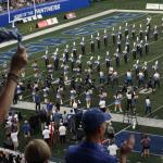 Georgia State players run on to field through band and cheerleaders